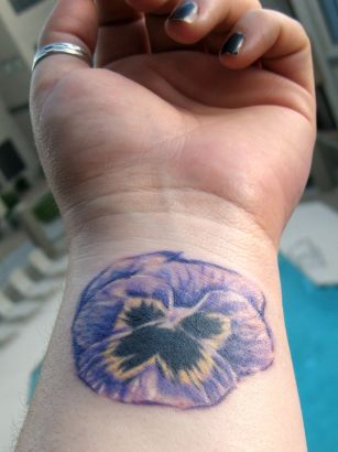 Flower Tats Design On Wrist.